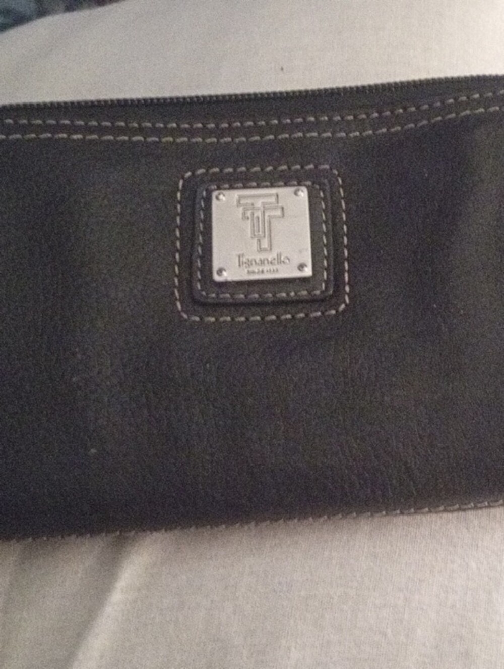 Tignanello Black Leather Zip Around Wallet with Metal Logo Plate